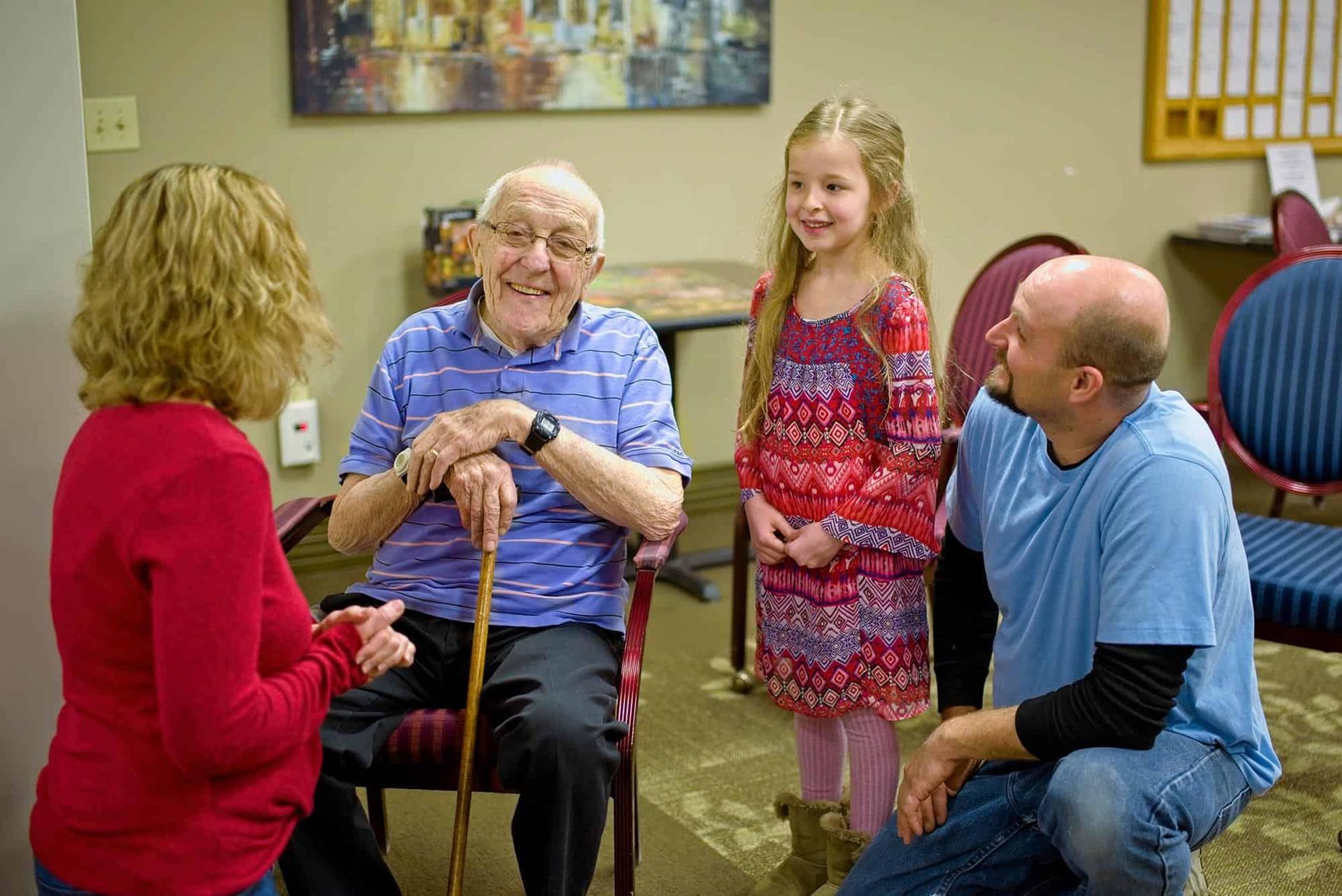 Senior living residents and visitors enjoying community amenities
