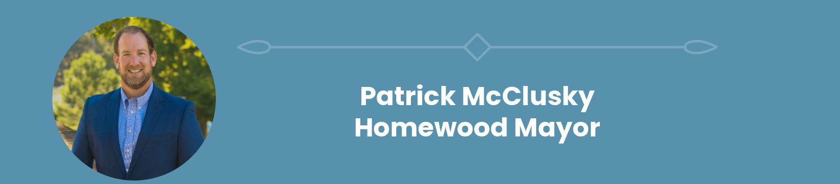 Patrick mcclusky is the homewood mayor and he is wearing a suit and tie.
