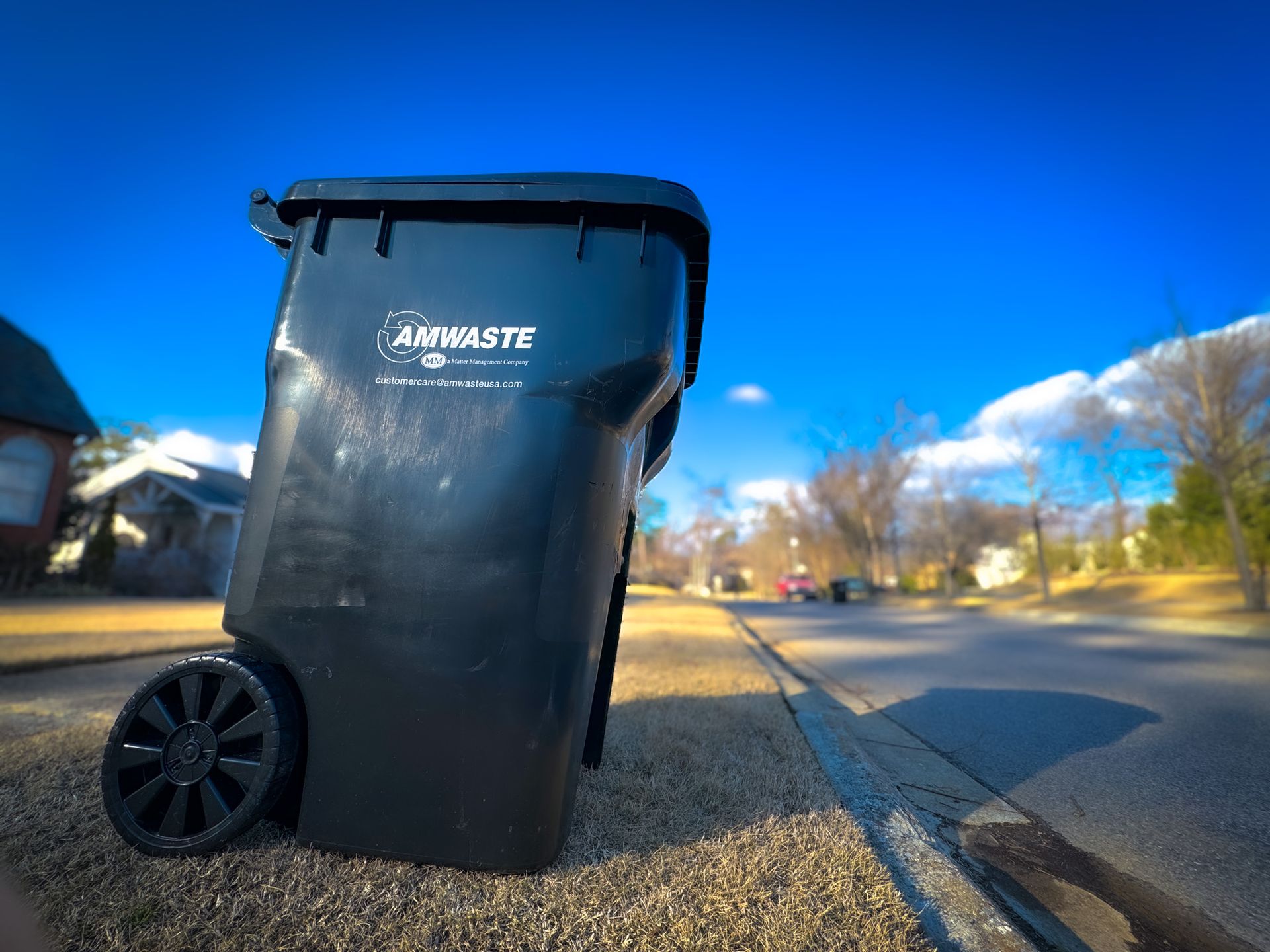 Residential garbage cart along a neighborhood street
