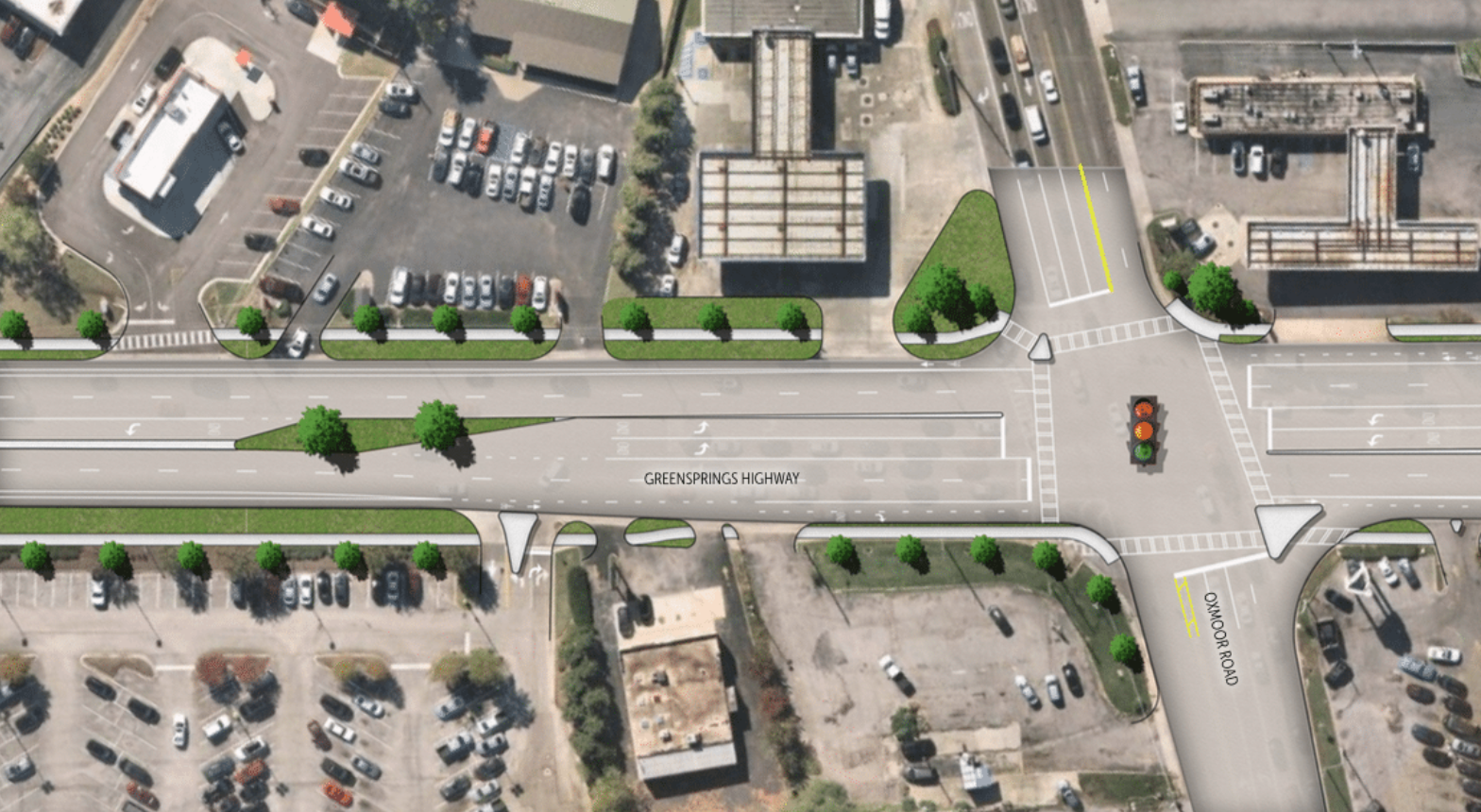 An aerial view of an intersection with a red light