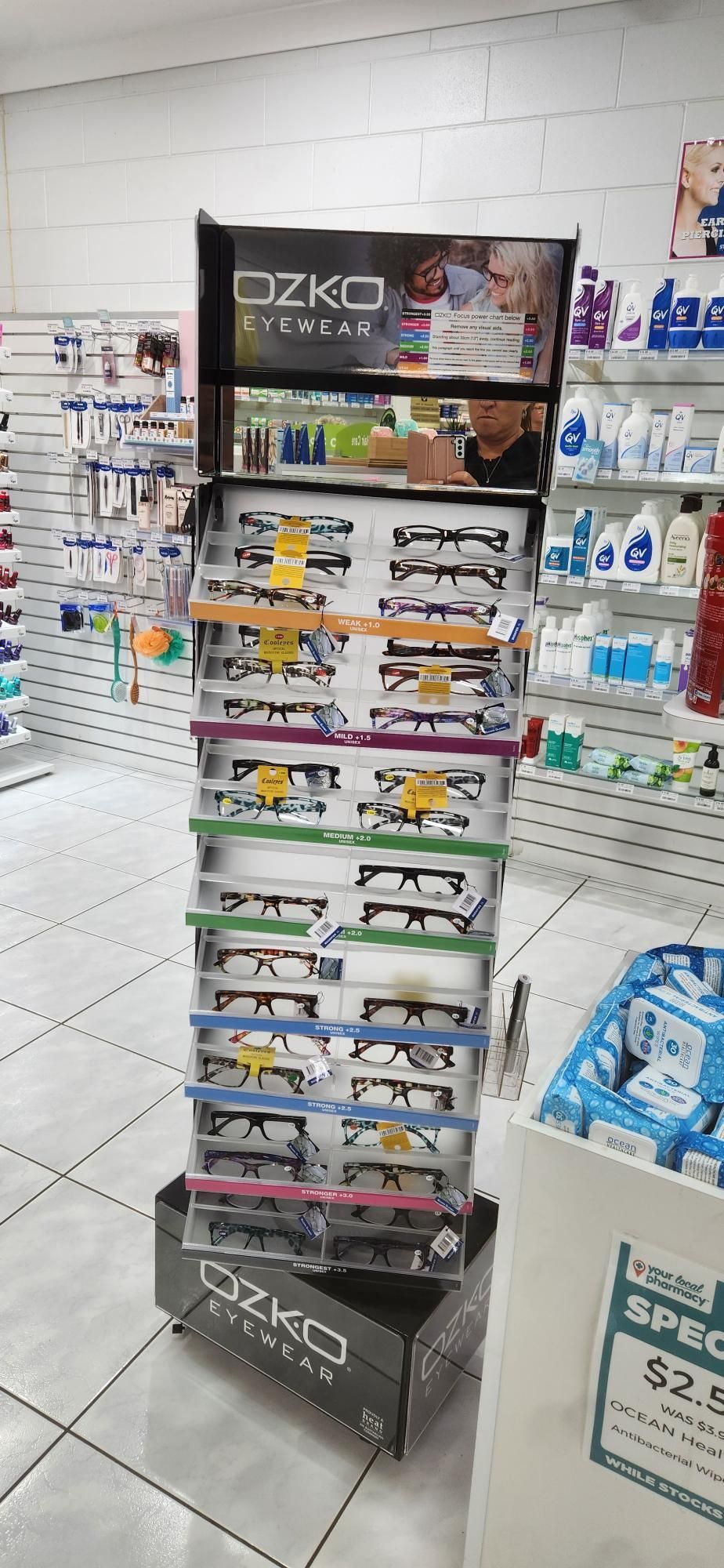 Glasses On A Stand in a Pharmacy — Bluewater Pharmacy in Balgal, QLD