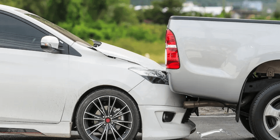 White car hitting back of pick up truck — Waipahu, HI — Westside Fender/Body & Refinishing