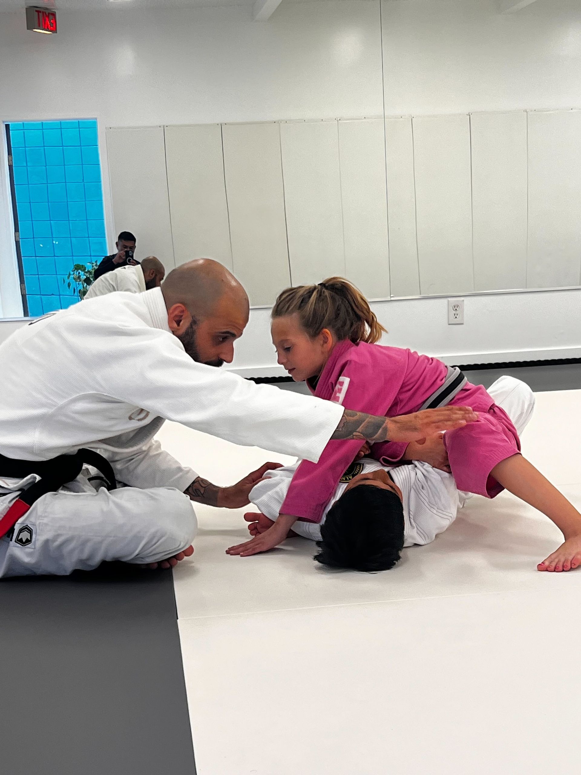 Adults practicing Jiu-Jitsu drills at Almighty Jiu-Jitsu in Huntington Beach, CA.