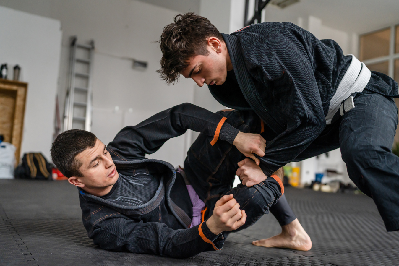 Beginners drilling Jiu-Jitsu fundamentals at Almighty Jiu-Jitsu in Huntington Beach, CA.