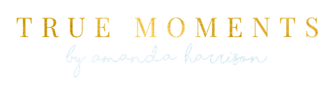 Gold “TRUE MOMENTS” text with faint script “by amanda harrison” on a white background