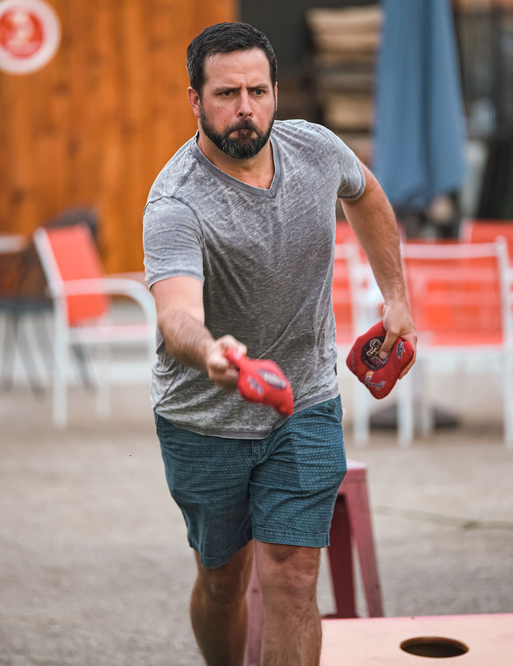 Man Playing Cornhole