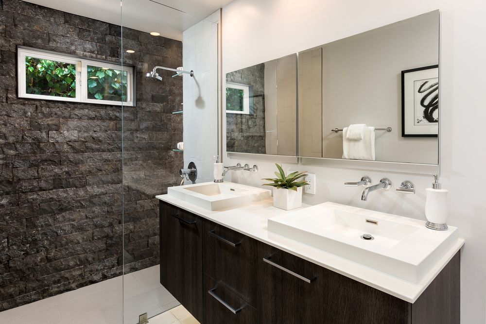 Modern Bathroom With Dark Stone Shower Wall — Dimond J Carpentry in Maroochydore, QLD