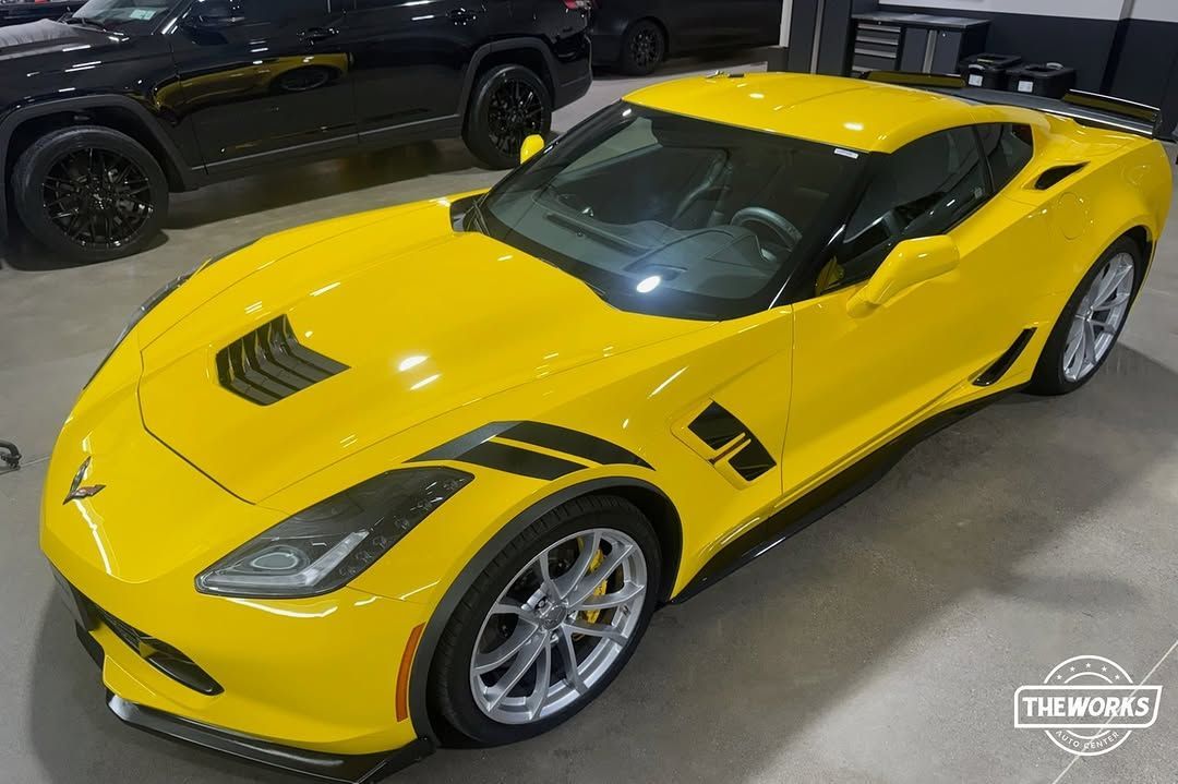 Bright yellow Chevrolet Corvette sports car.
