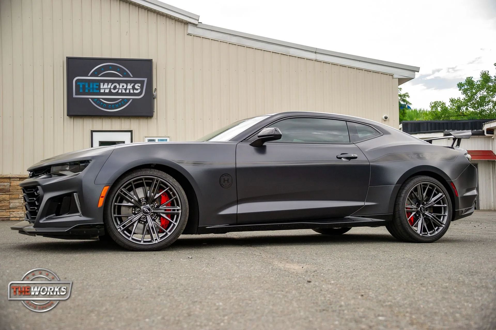 Luxury car with paint protection film in Albany, NY, shielded against gravel, rock chips, and winter road salt for long-lasting shine.