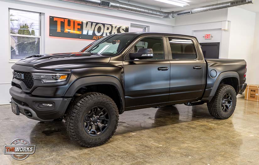 Black Ram TRX pickup truck in a shop with