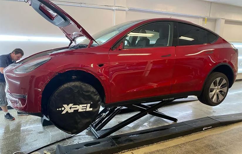 Luxury car with paint protection film in Albany showcasing glossy, showroom-ready finish after professional installation.