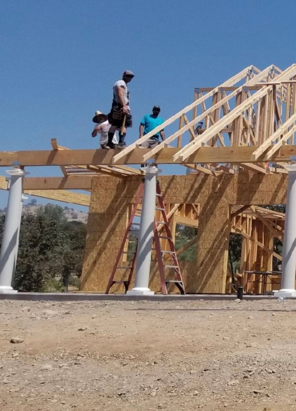 Danny Everett building house.