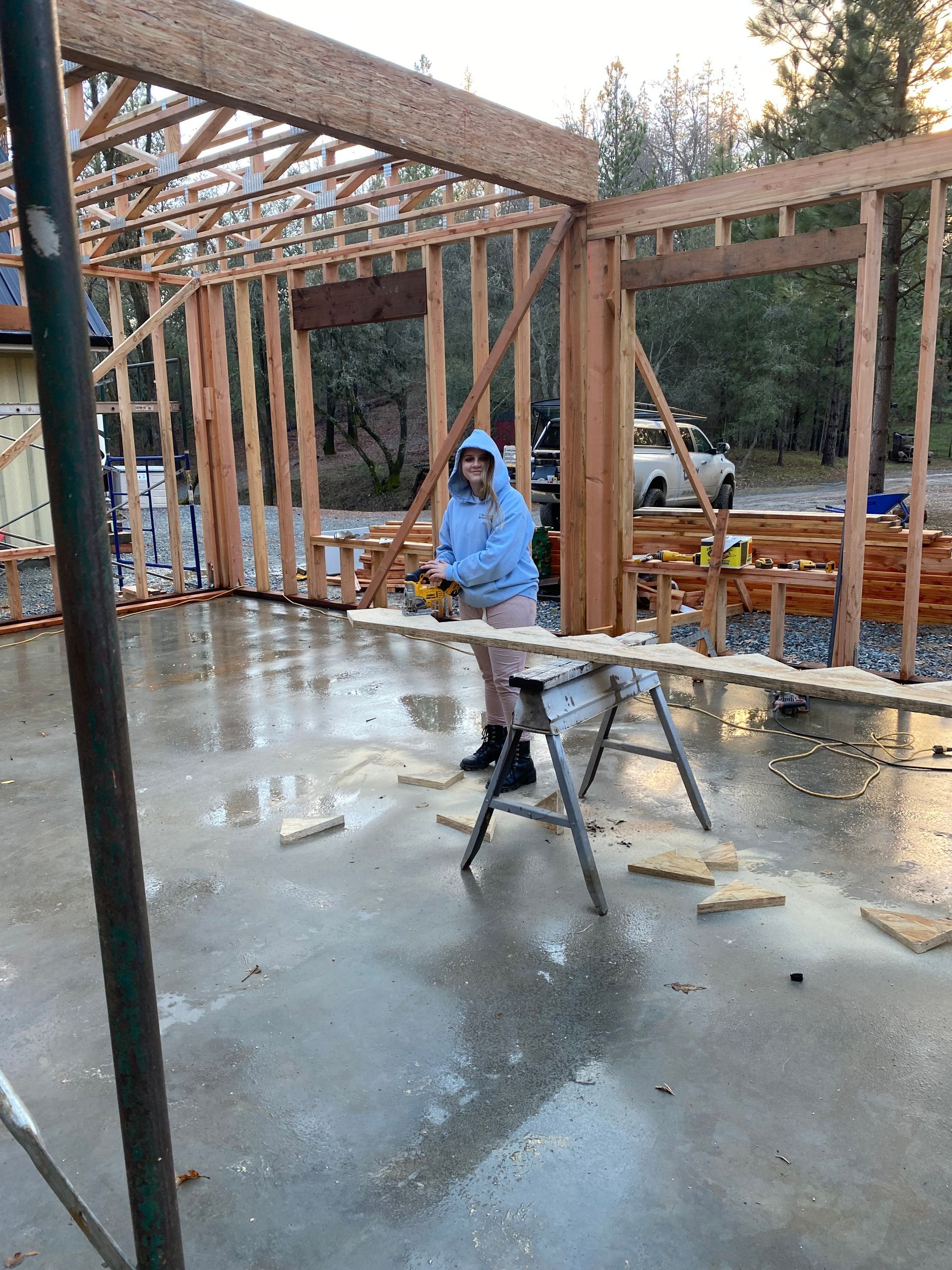 The kids helping build the house.