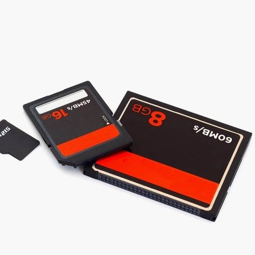 Two memory cards one of which has the number 8gb on it