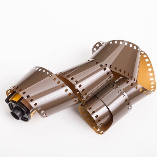 A close up of a roll of film on a white background