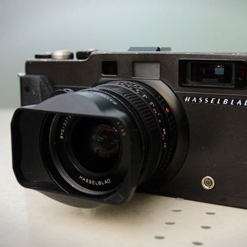 A hasselblad camera is sitting on a table