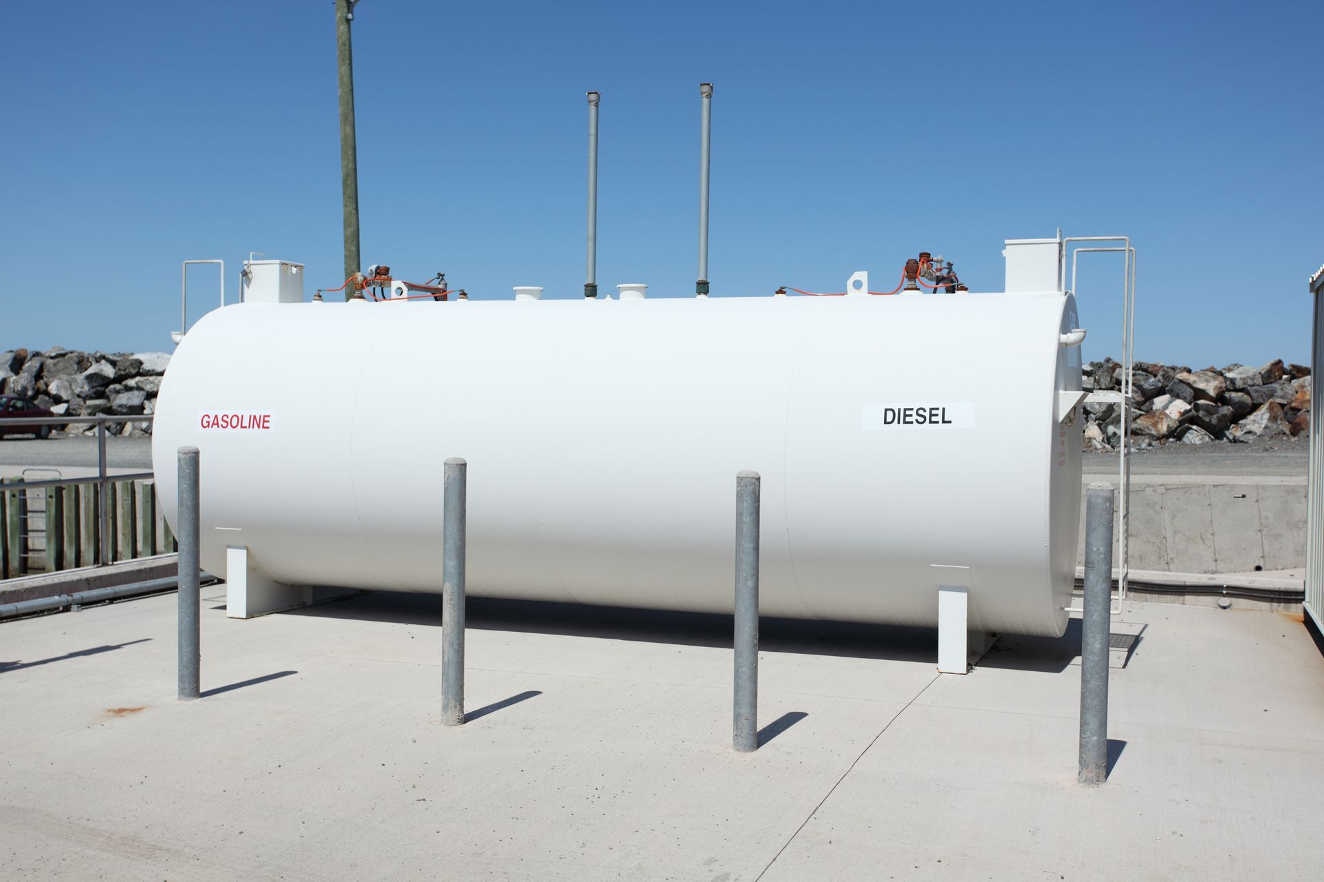 A large white tank with the word diesel on it