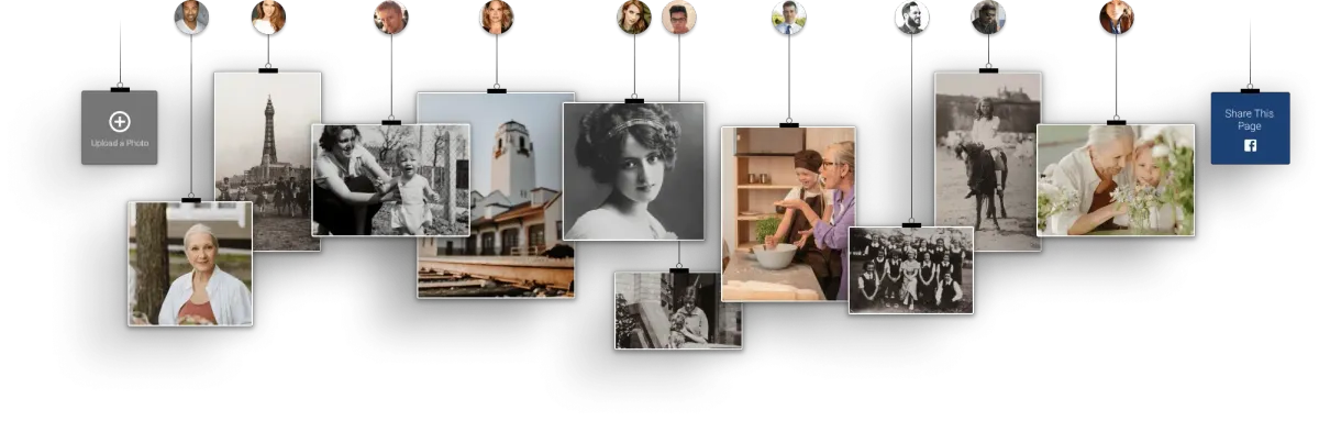 A row of framed black-and-white photos hanging on a wall with string lights and small hanging ornaments.