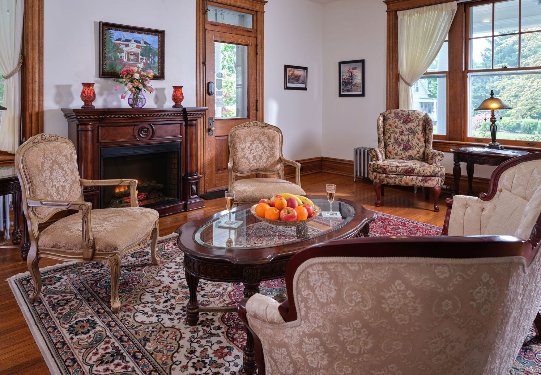 A living room filled with furniture and a fireplace.
