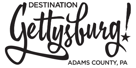 A black and white logo for destination gettysburg adams county , pa.