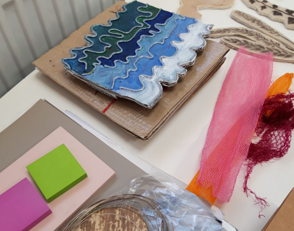 A variety of printing and lino cut techniques shown on a crafting table
