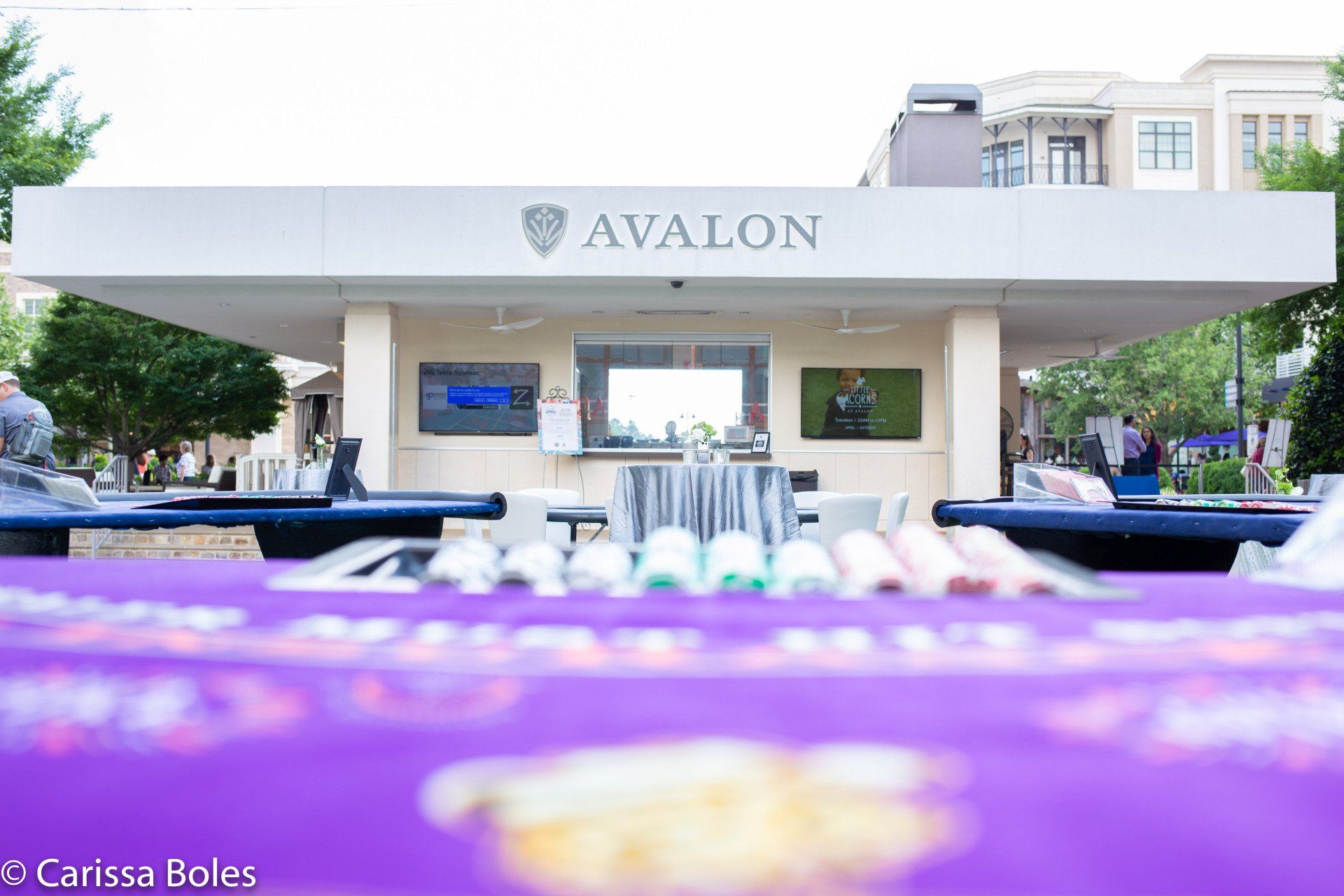 A white building with the word avalon on it