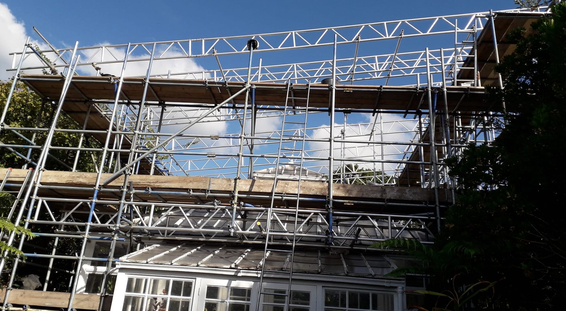 A large building with scaffolding on the side of it