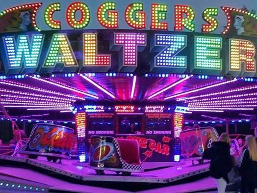A colorful sign that says cogger 's waltzer on it