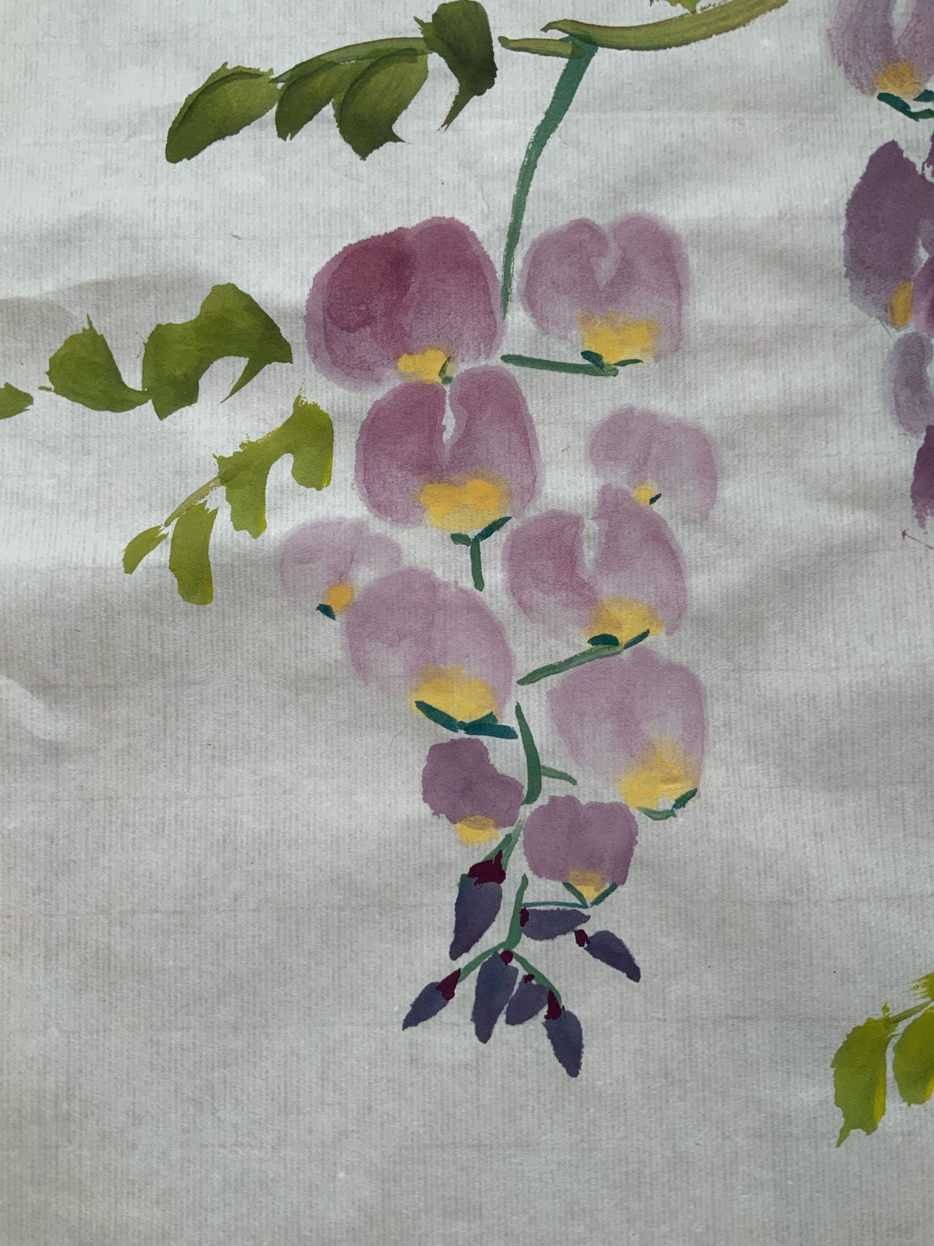Watercolor-style purple flowers with green leaves on white fabric background