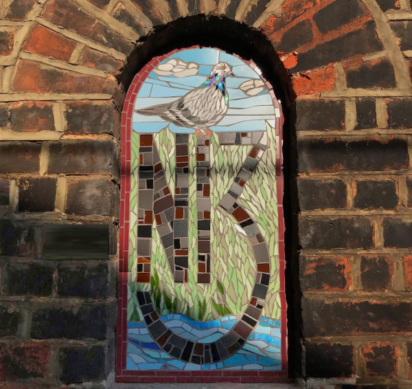 A stained glass window with the letter n on it