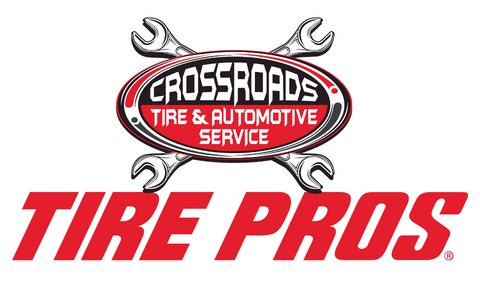 Crossroads Tire & Automotive Service Tire Pros logo with crossed wrenches in red, white, and gray
