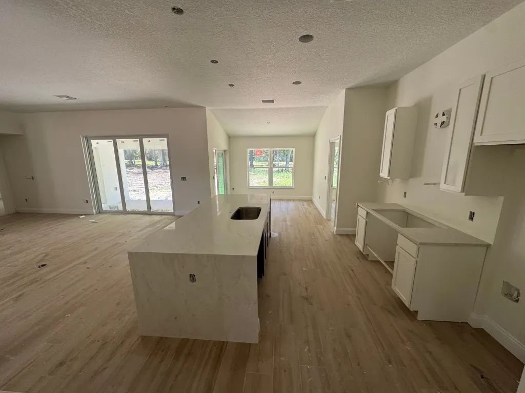 White granite countertop on a kitchen island