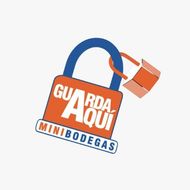 Logo naranja y azul de Mini Bodegas con un candado, texto “Guarda aquí”.