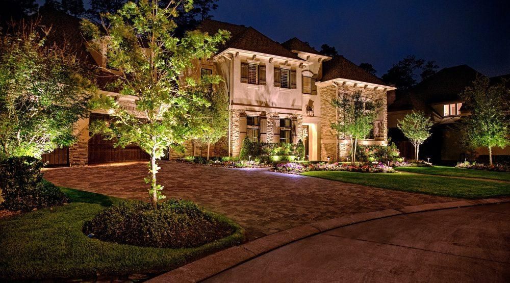 Luxury home landscape lighting in Buffalo Grove IL with illuminated trees, walkway, and front yard design by Shelly’s Landscape Luxury home landscape lighting in Buffalo Grove IL with illuminated trees, walkway, and front yard design by Shelly’s Landscape