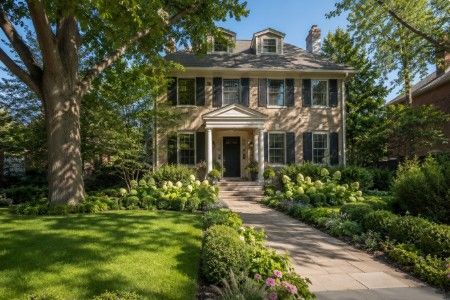 Backyard transformation with patio seating, dining area, lush landscaping and privacy plantings in Evanston Illinois Backyard transformation with patio seating, dining area, lush landscaping and privacy plantings in Evanston Illinois