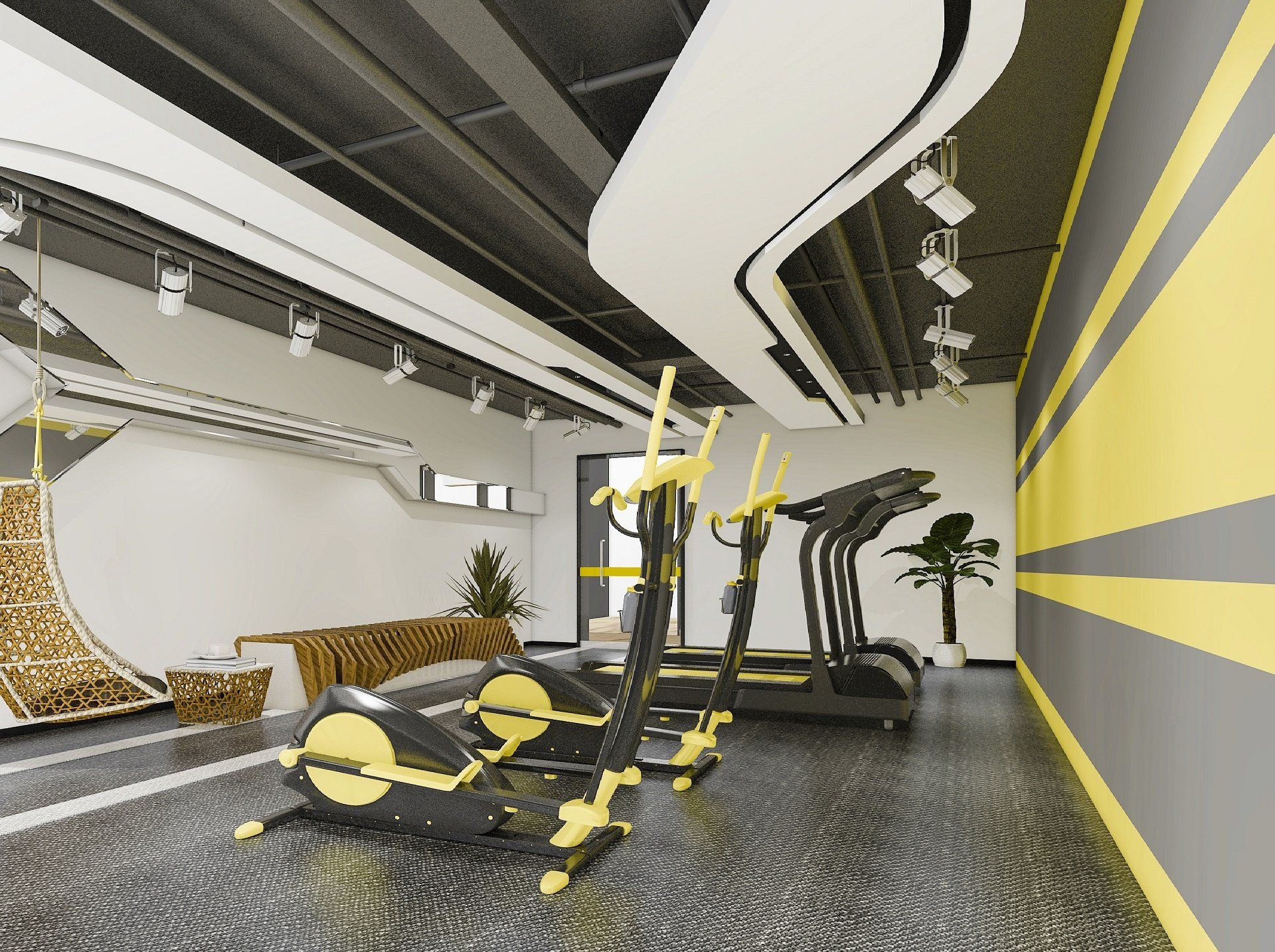 A gym with a lot of exercise equipment and a couch.