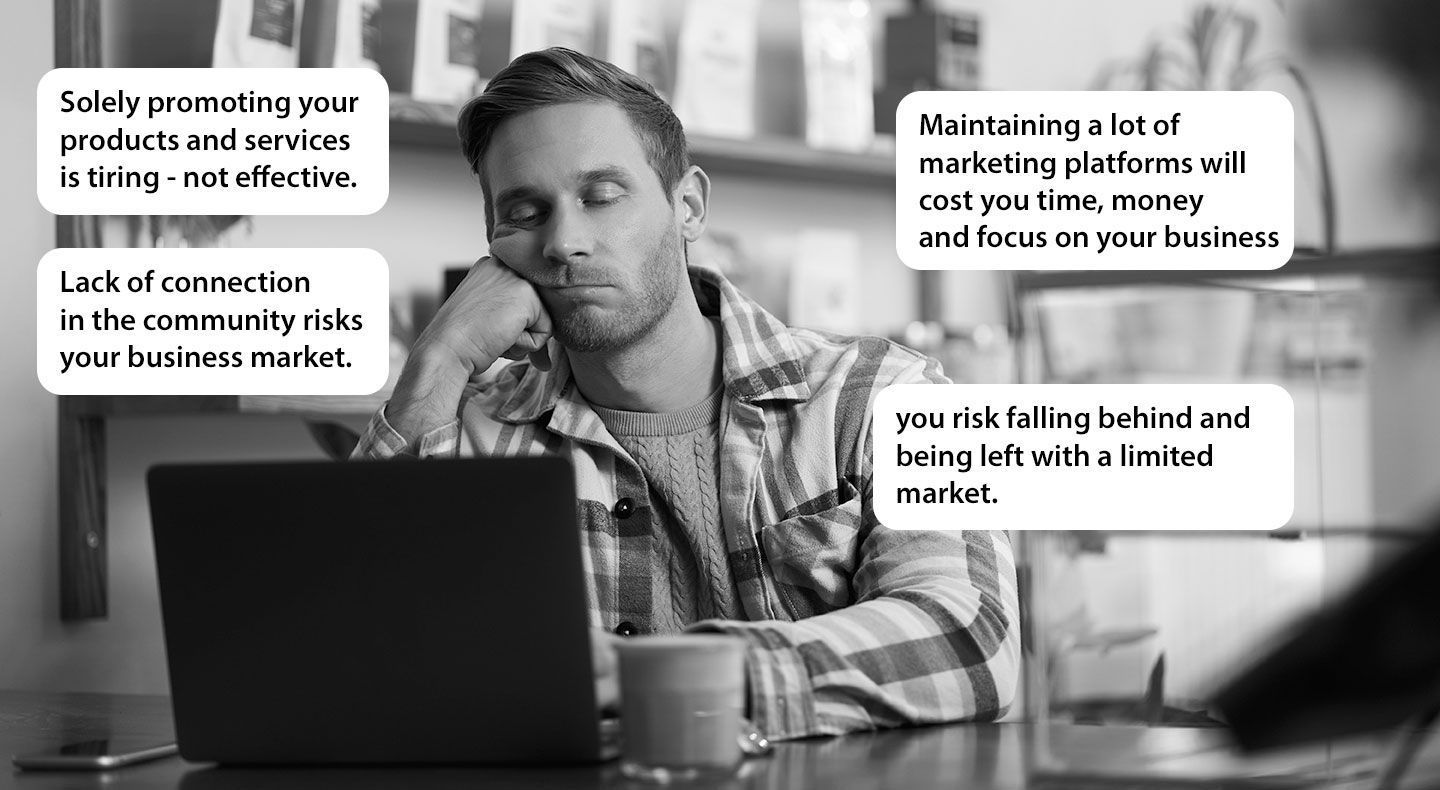 A tired person looks at a laptop surrounded by text bubbles listing business marketing challenges.