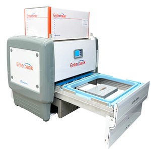 An Enterpack food tray sealing machine with a white body, grey side panels, and a blue tray holder extended in front.