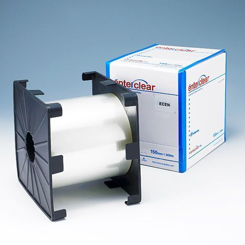 A roll of clear Interclear plastic film on a black plastic spool next to its white and blue packaging box.