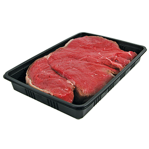 Raw red beef steaks resting in a black plastic food tray.