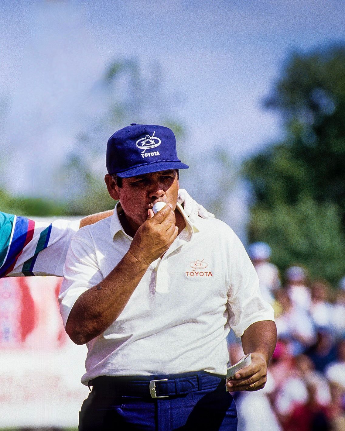 Golf winner with trophy