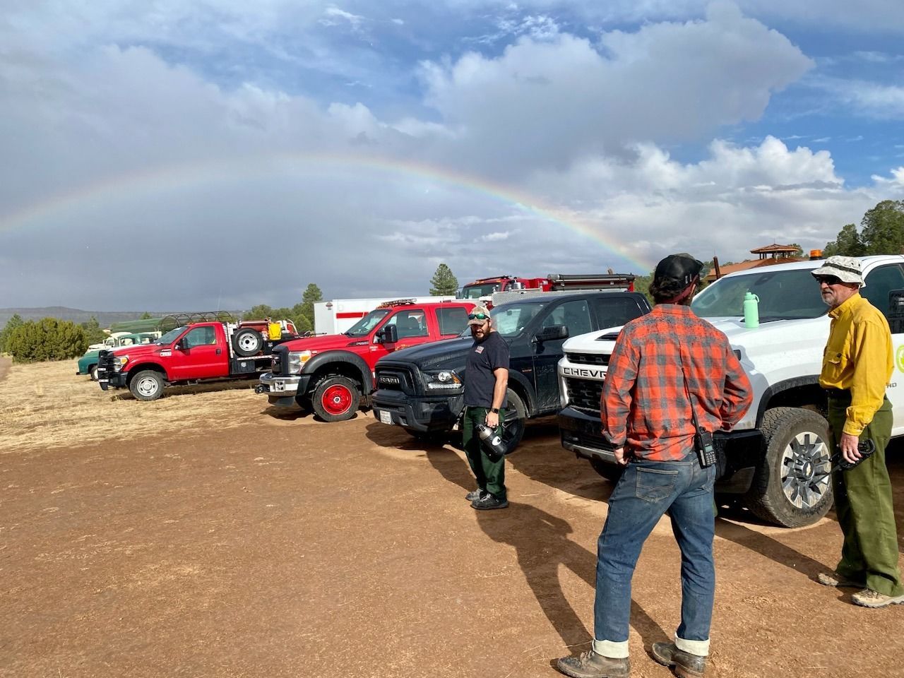 Trucks and people line up at the start of the Rx burn day.