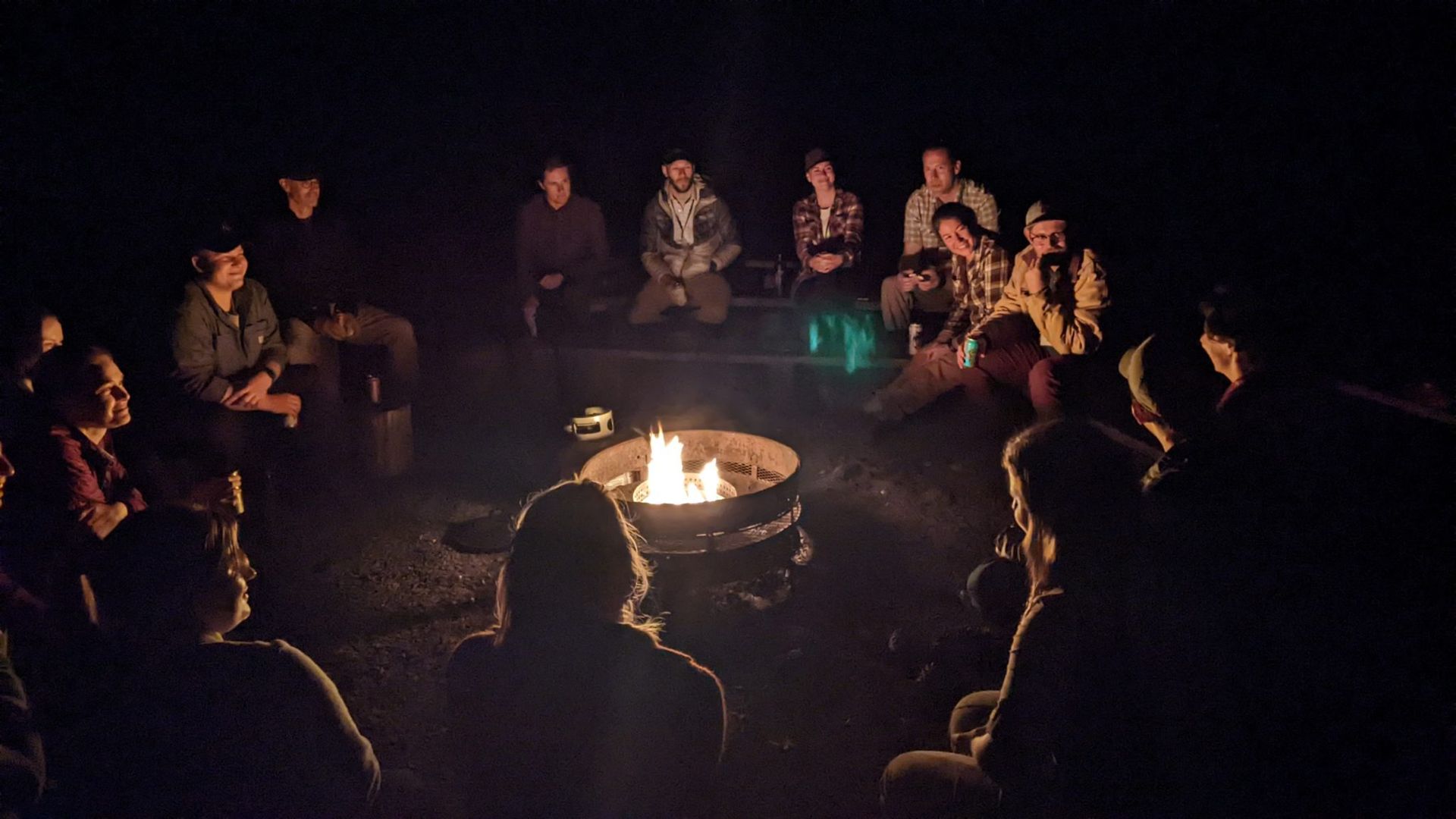 NFIS attendees around campfire