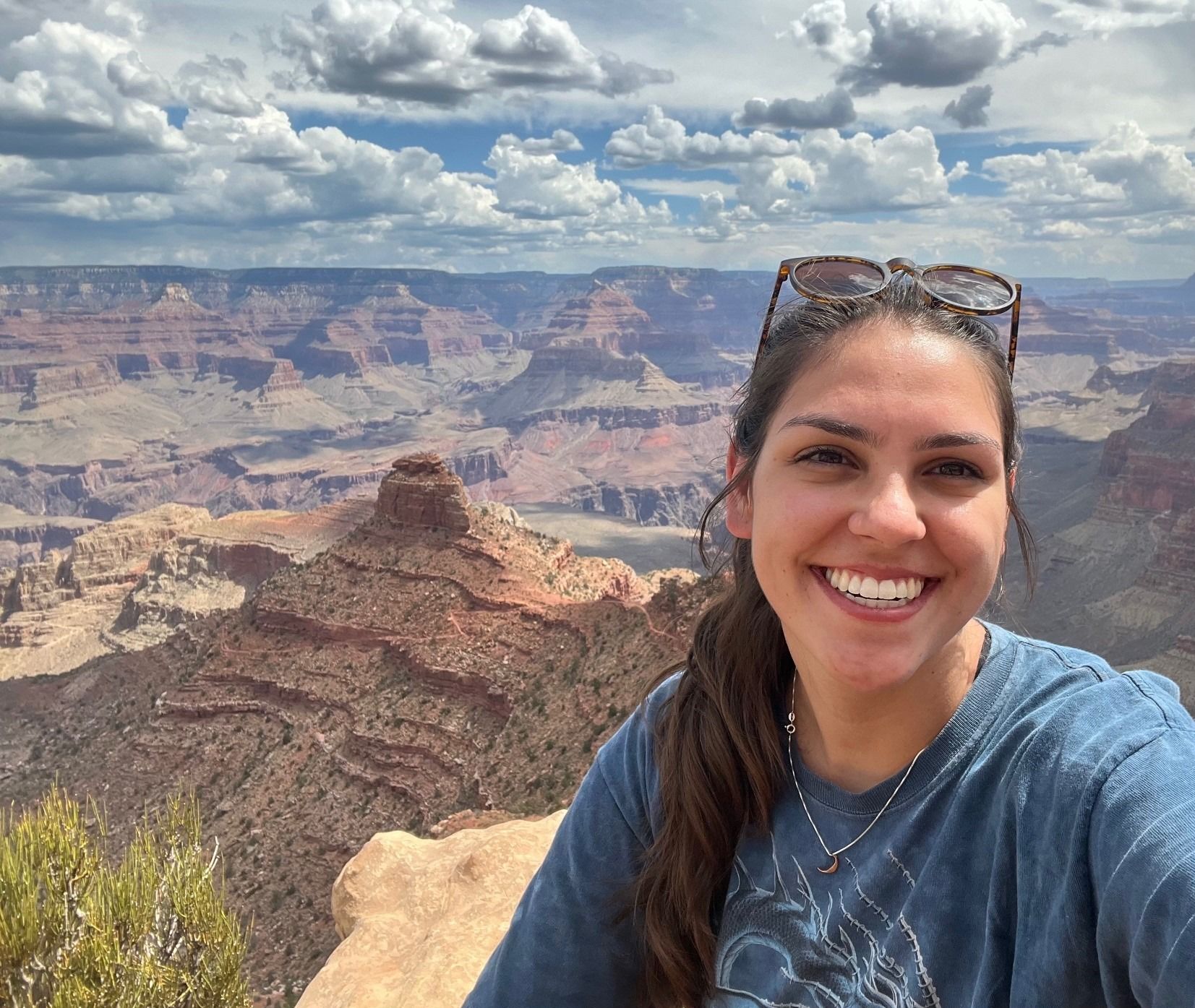 Photo of Megan in front of Southwest landscape