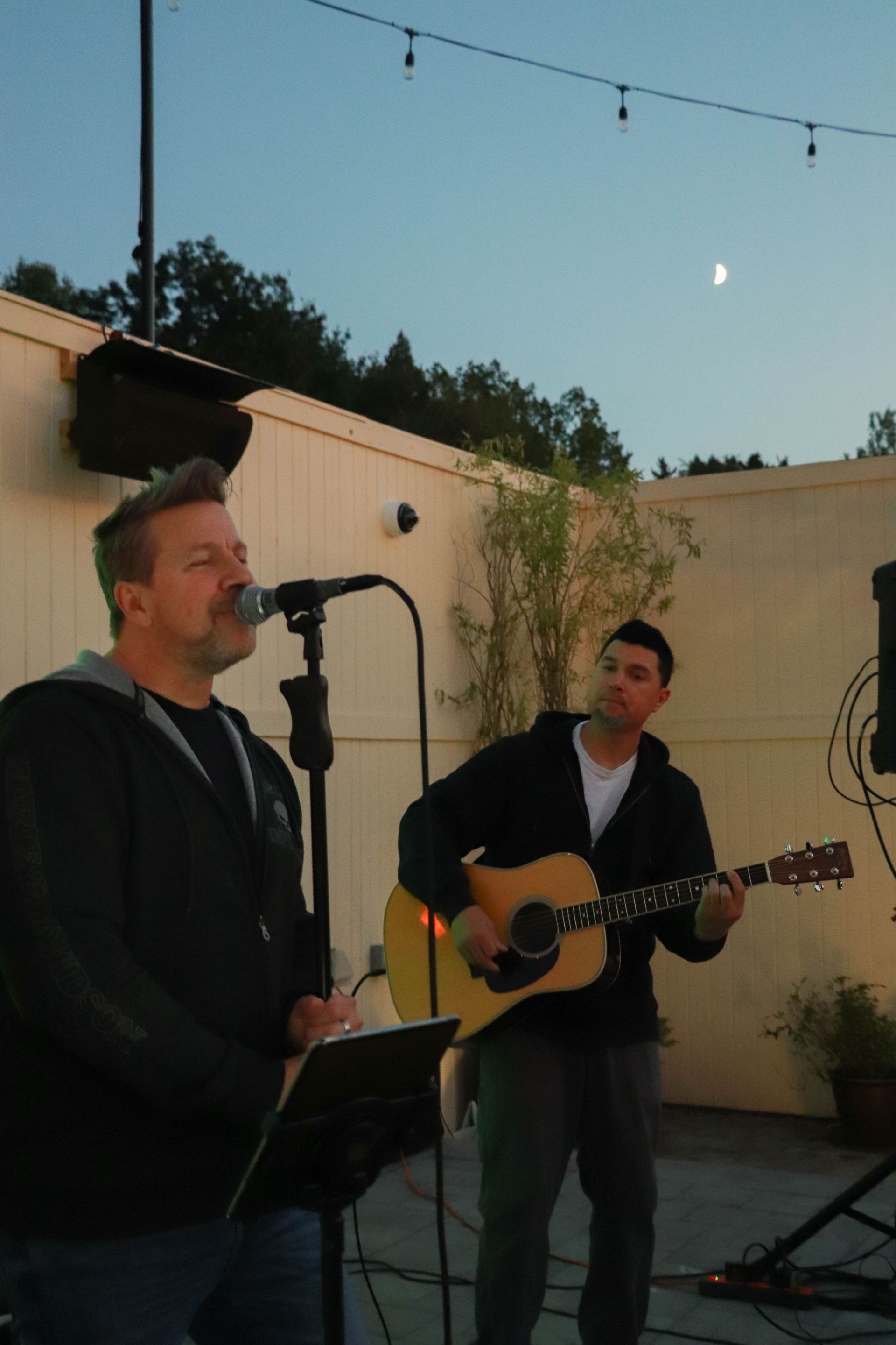 Singer and Guitar Player Performing at Telly's Restaurant & Pizzeria