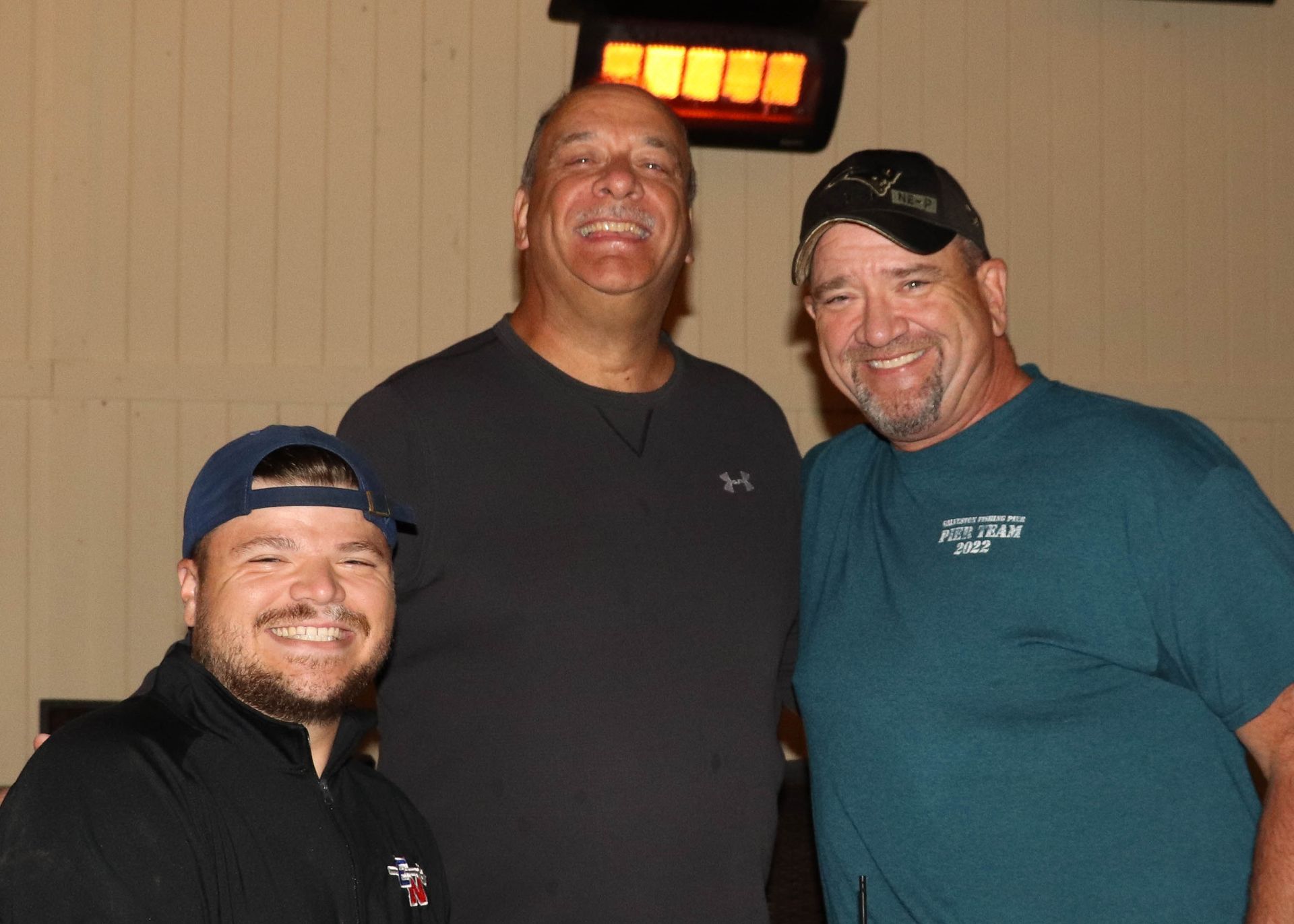 Smiling Staff Members and Guests at Telly's Restaurant & Pizzeria