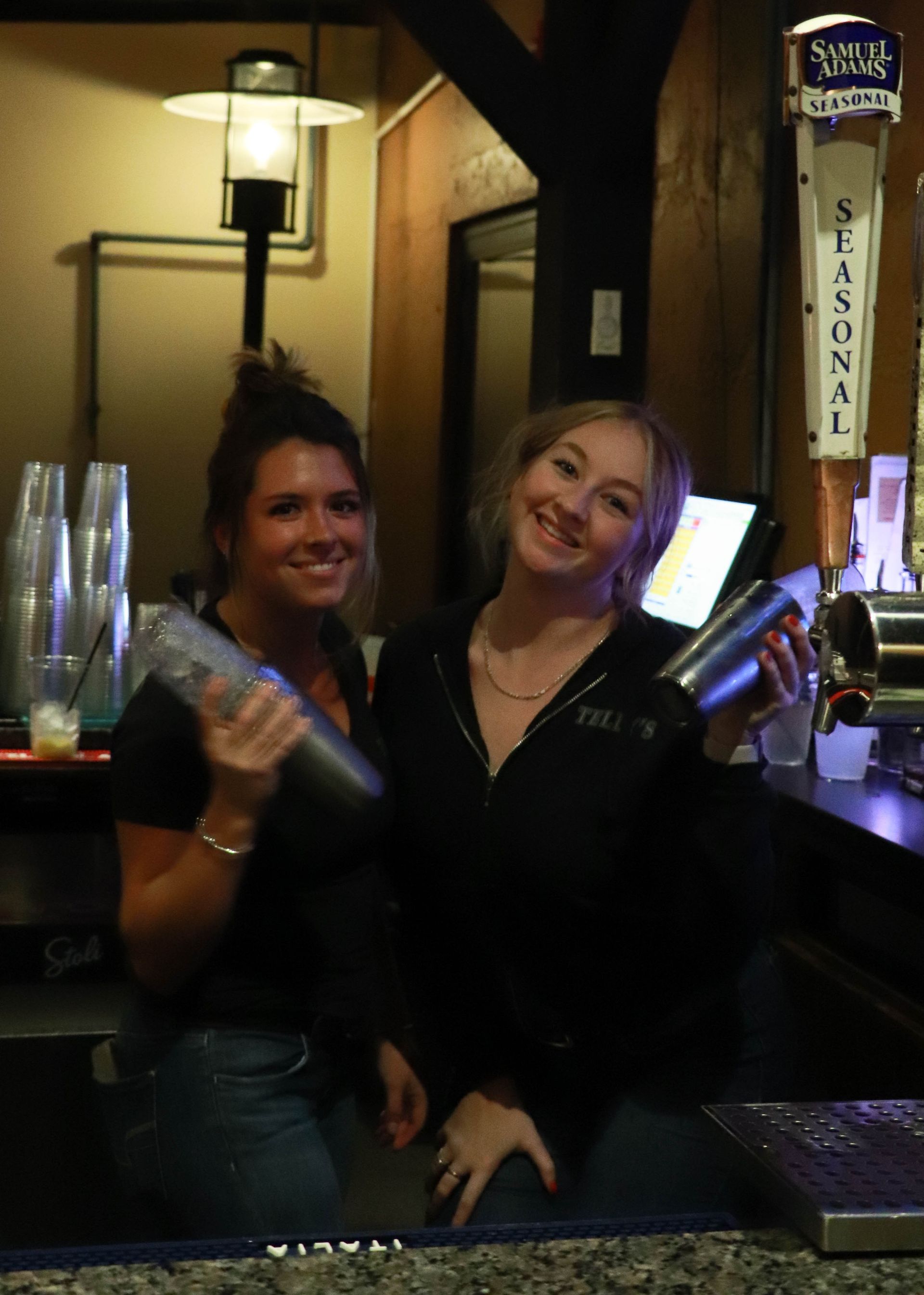 Smiling Bartenders Preparing Cocktails at Telly's Restaurant & Pizzeria
