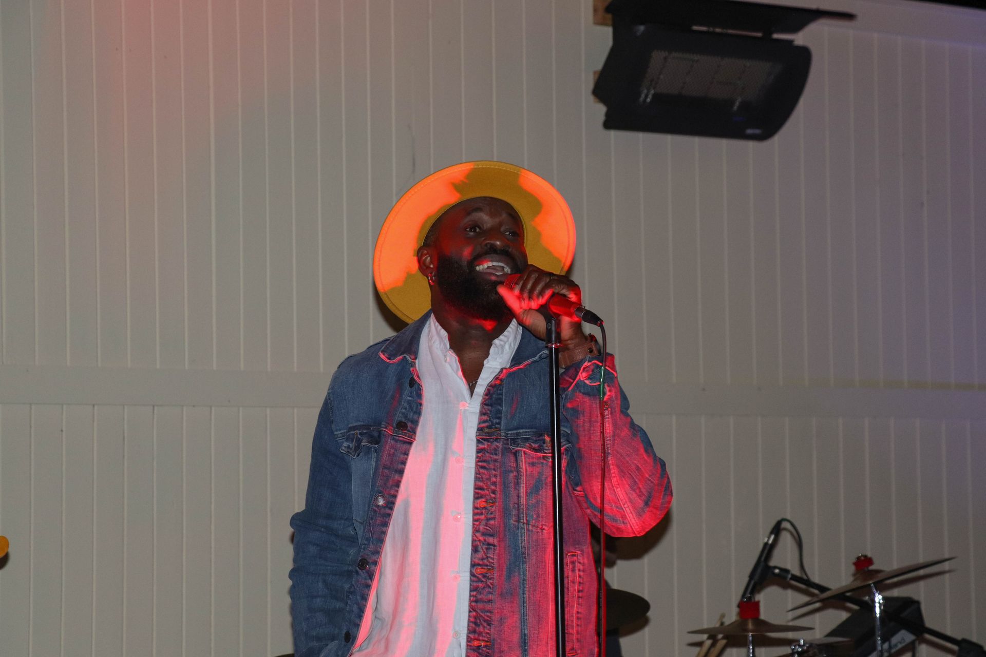 Singer Wearing Hat While Performing Live Entertainment