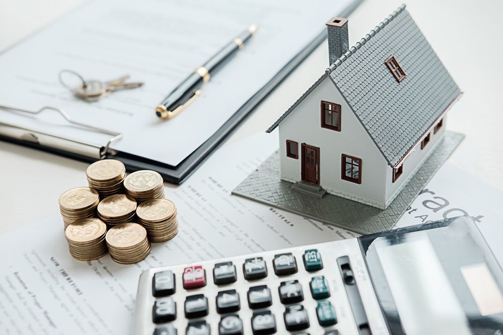 Model House, Coins, Calculator — Richardson Conveyancing In Hunter Valley, NSW