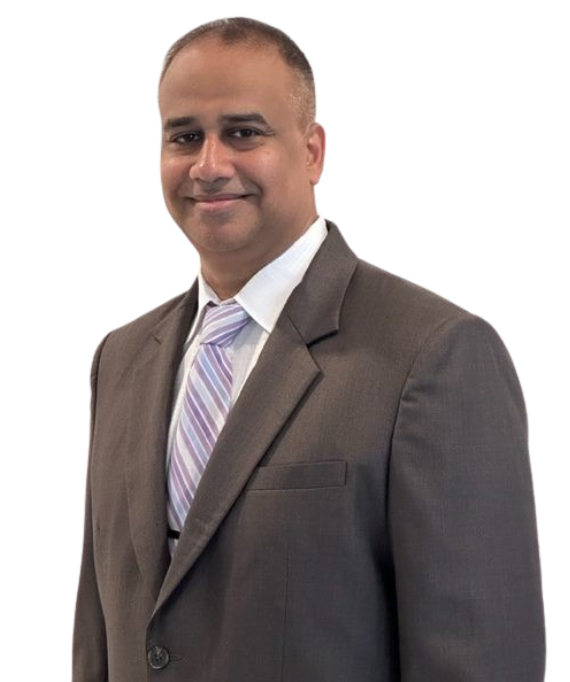 Man in a suit smiles at the camera. He wears a gray jacket and a striped tie, isolated on white.